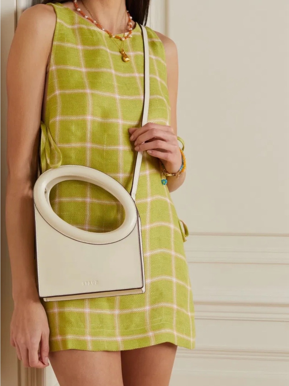 STAUD The Limone Bag 
White Oval-Handle Leather Crossbody Bag